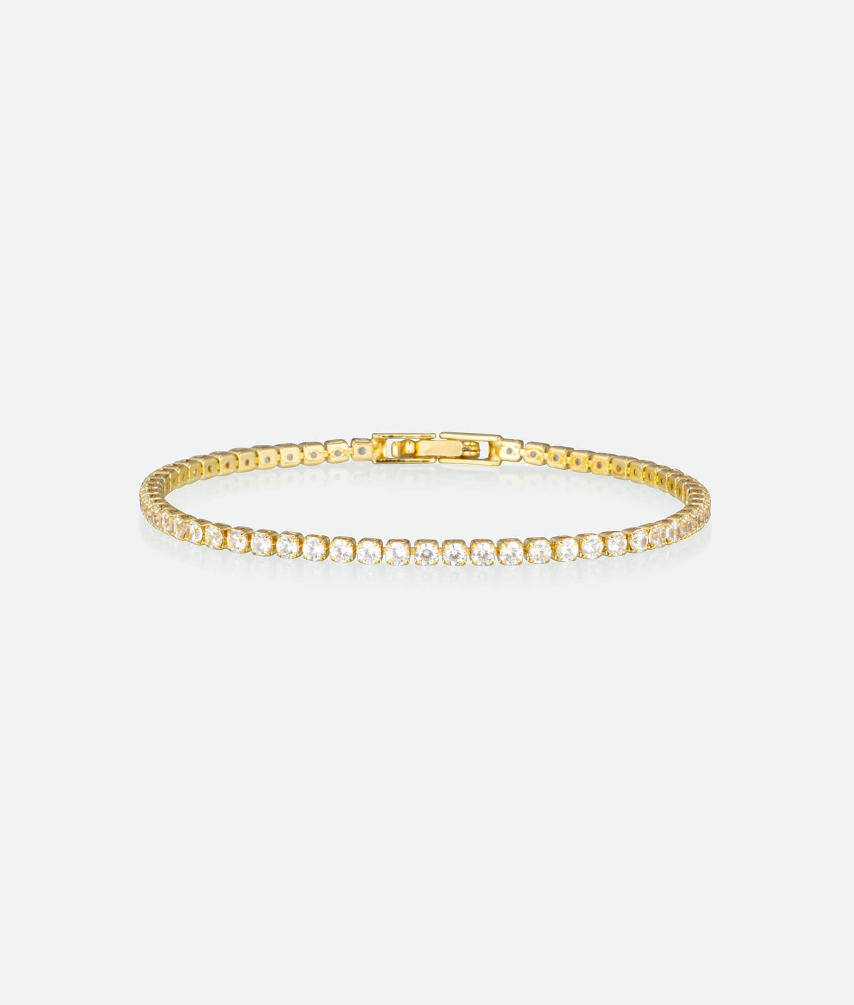 Gold bracelet on a white background