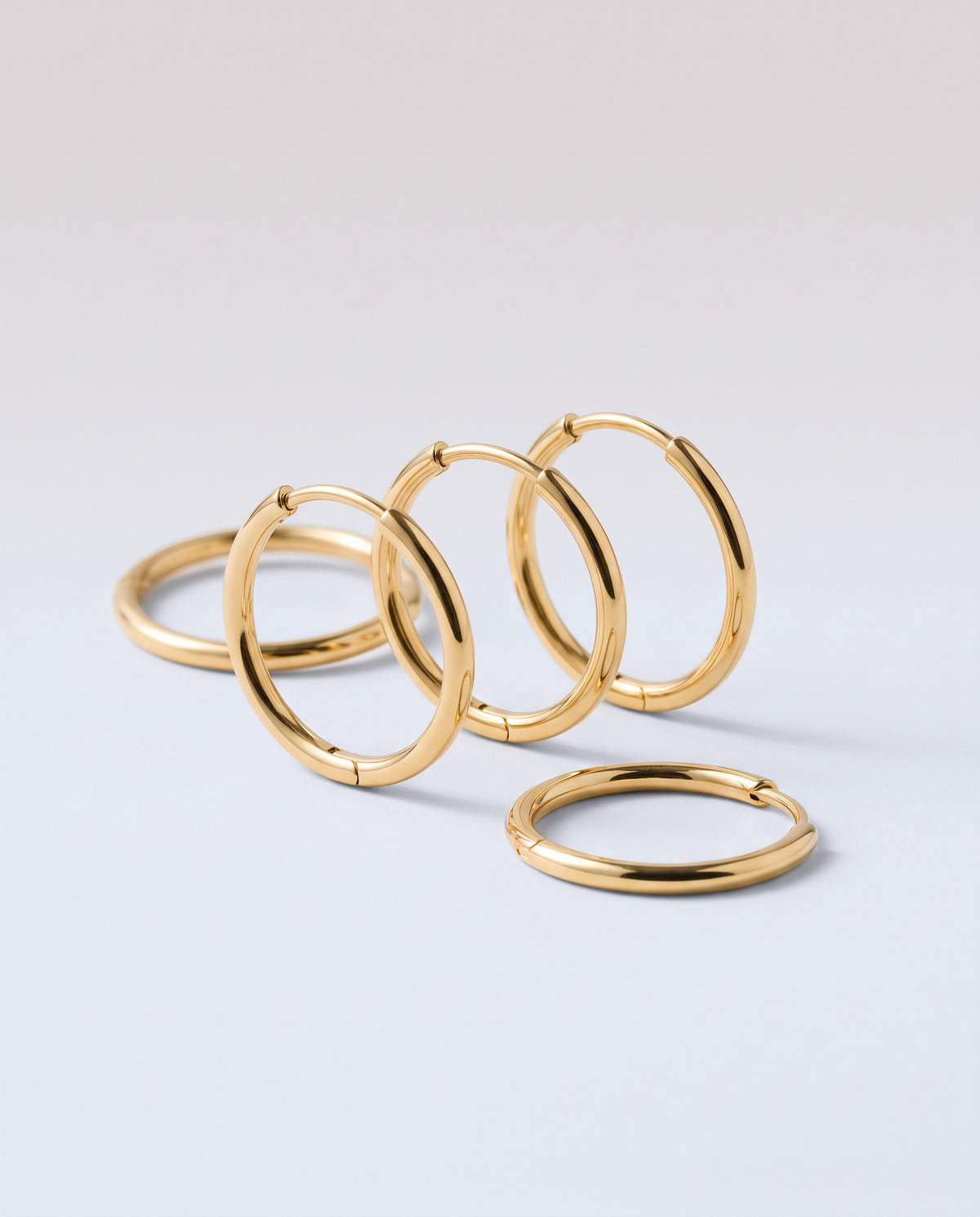 Buckle Huggie Earrings - angle