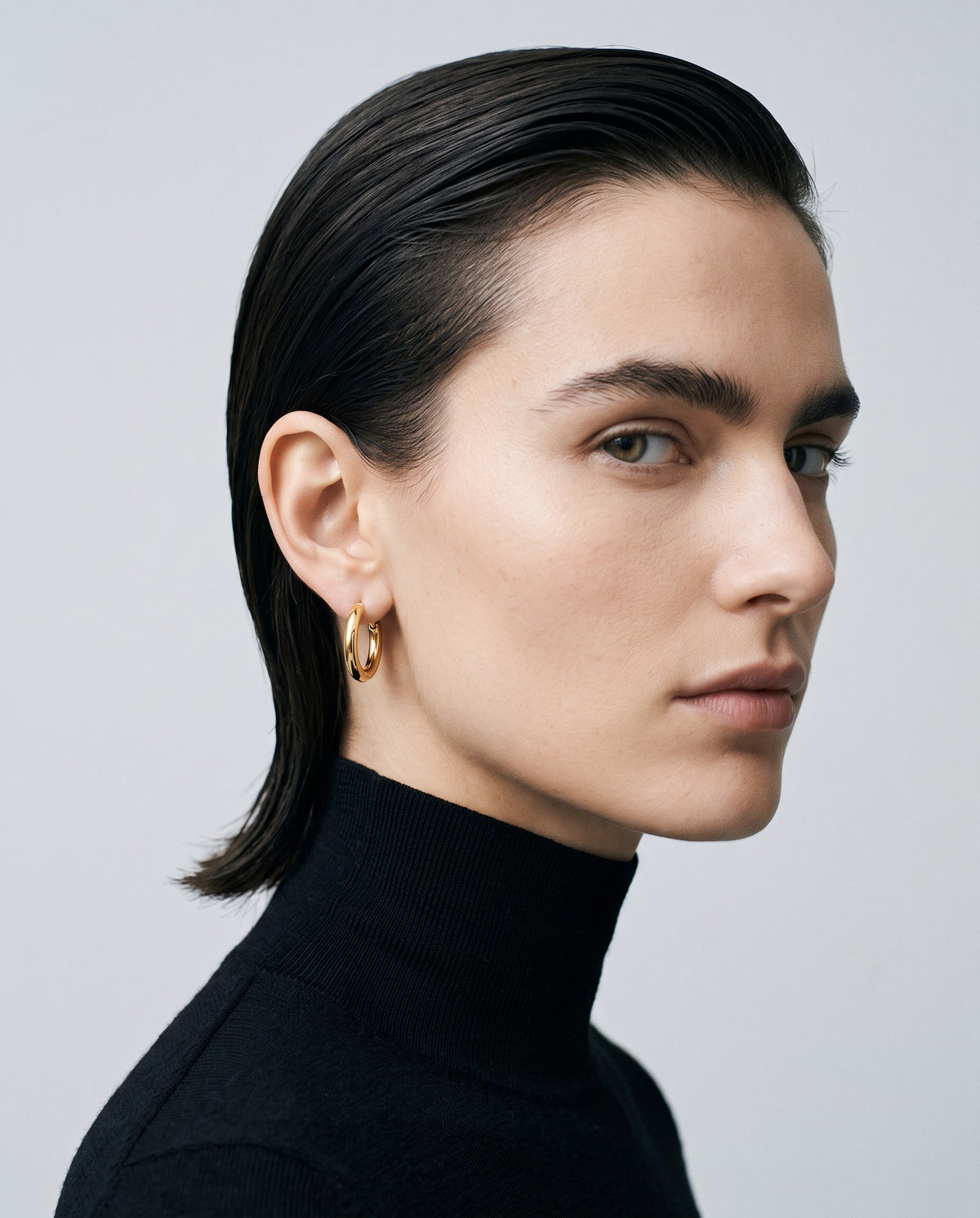 Ember Round Huggie Earrings – editorial campaign image