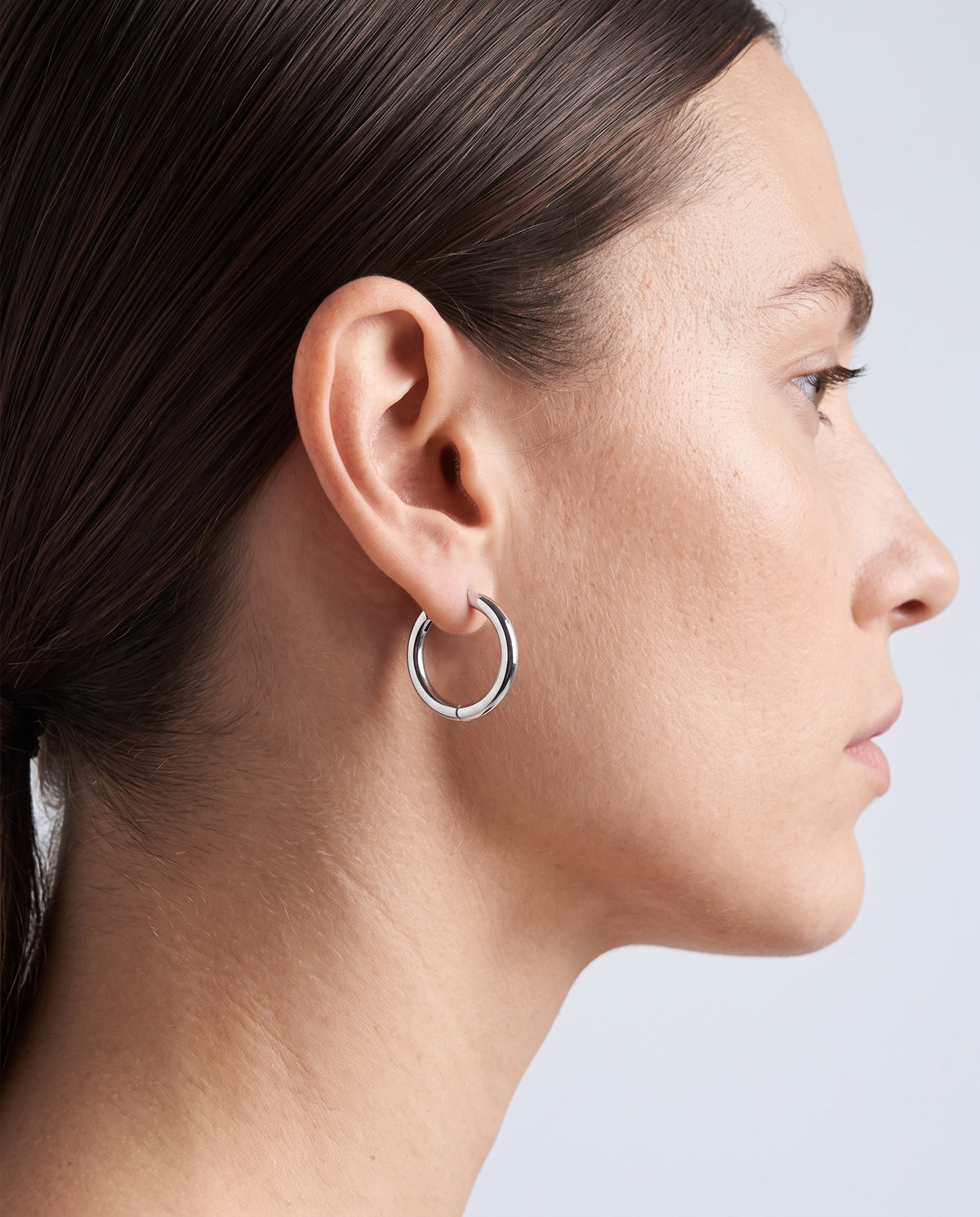 Ember Round Huggie Earrings - on model