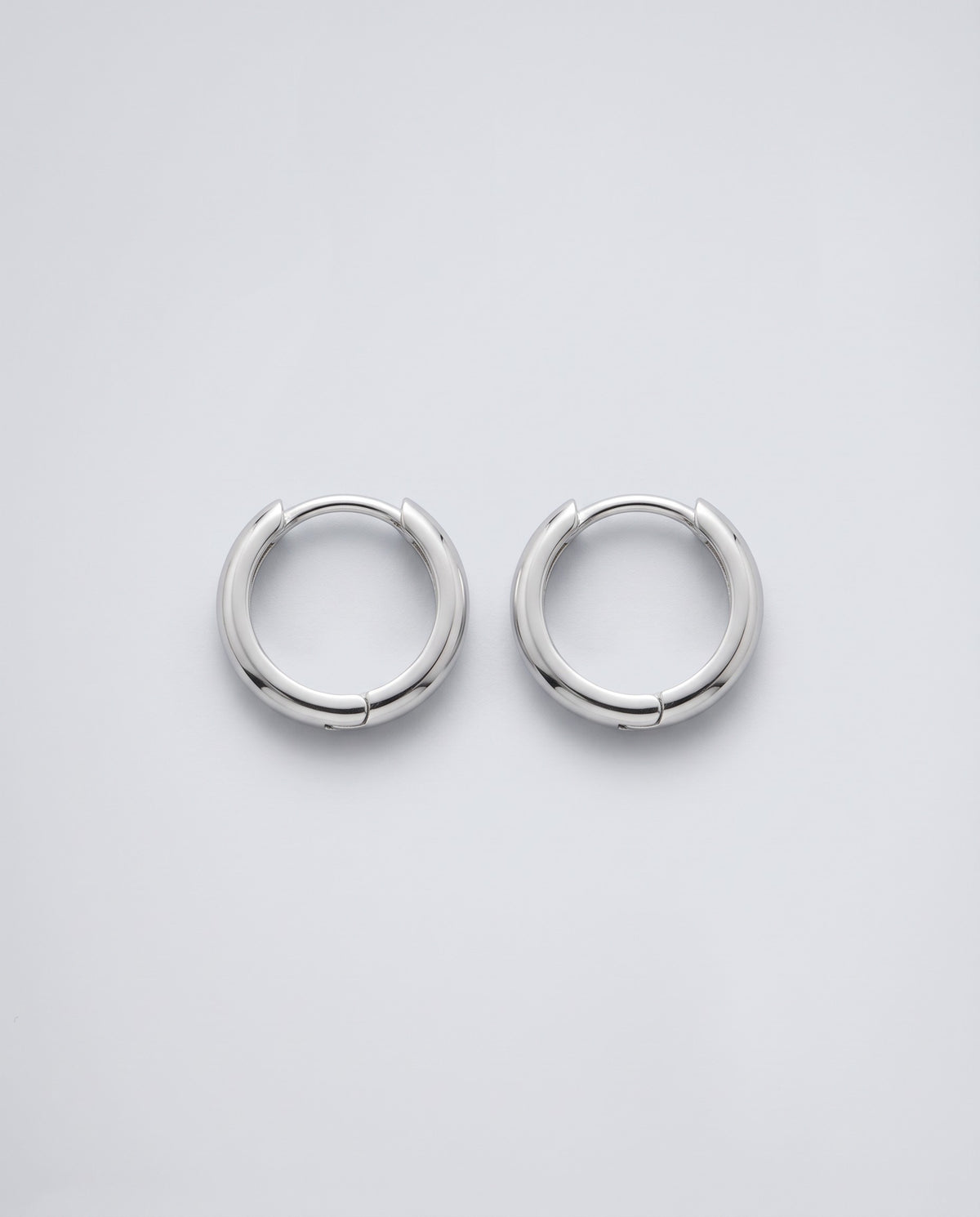 Ember Round Huggie Earrings – product photo