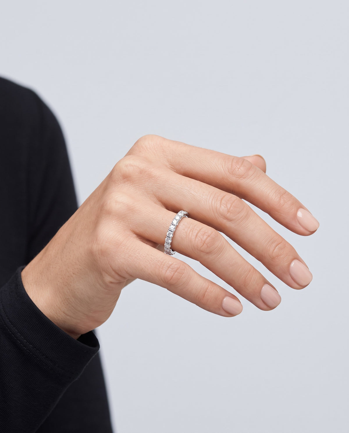 Infinity Moissanite Eternity Ring - on model