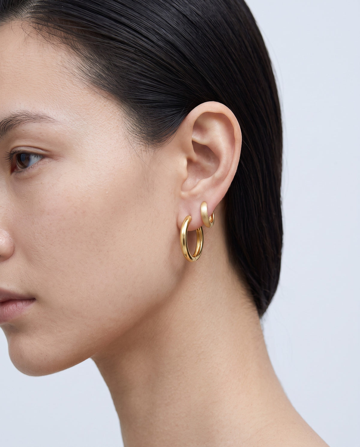 Slate Matte Huggie Earrings - on model