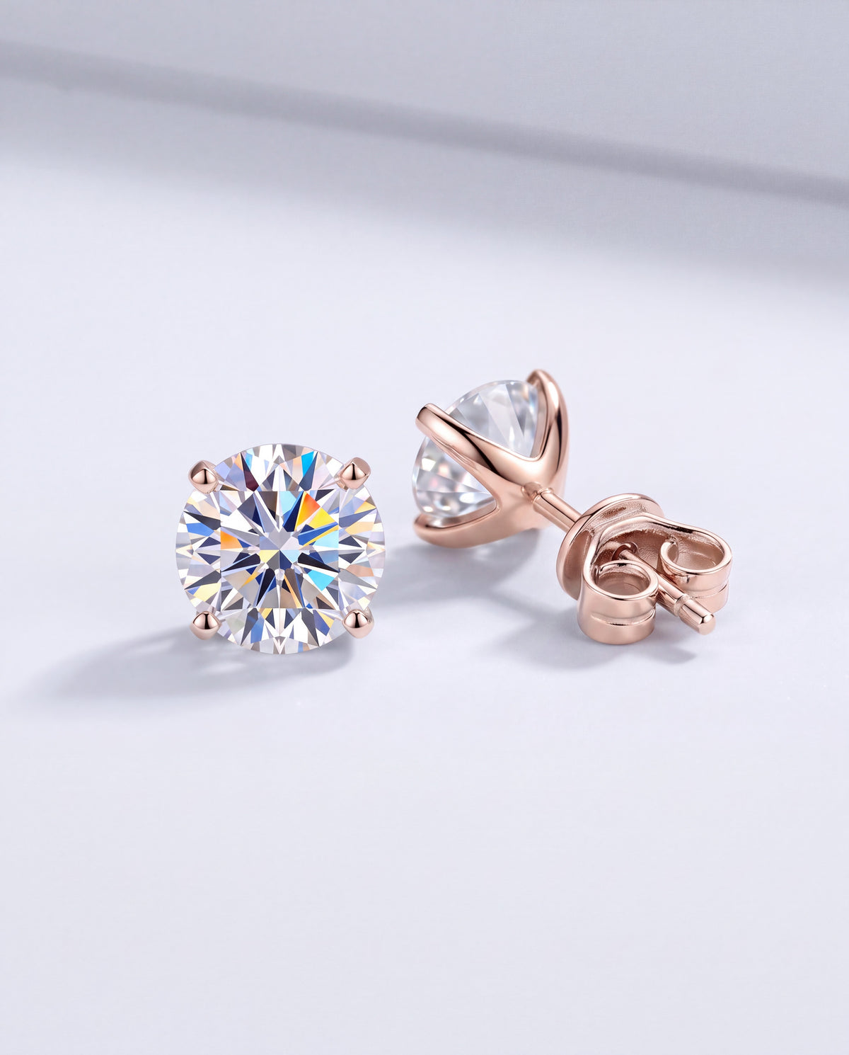 Spark Moissanite Claw Stud Earrings – Rose Gold product photo
