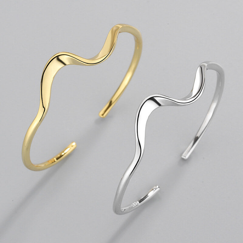Gold and silver wave cuff bracelets