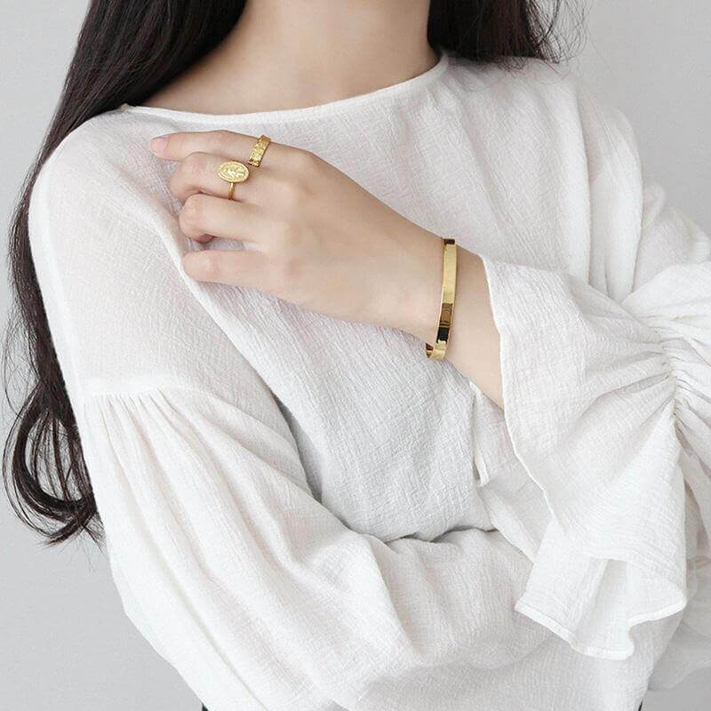 Model wearing Open Gold Cuff Bracelet