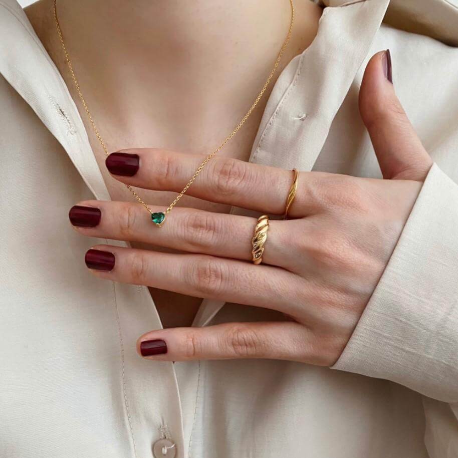 Woman wearing Emerald Heart Necklace