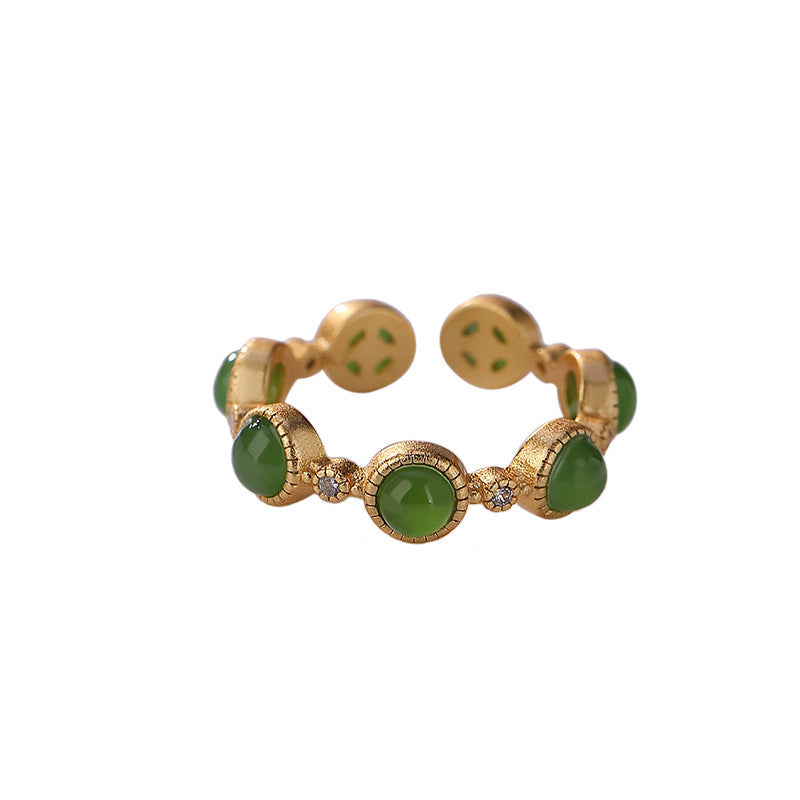 Green Seven Stone Ring