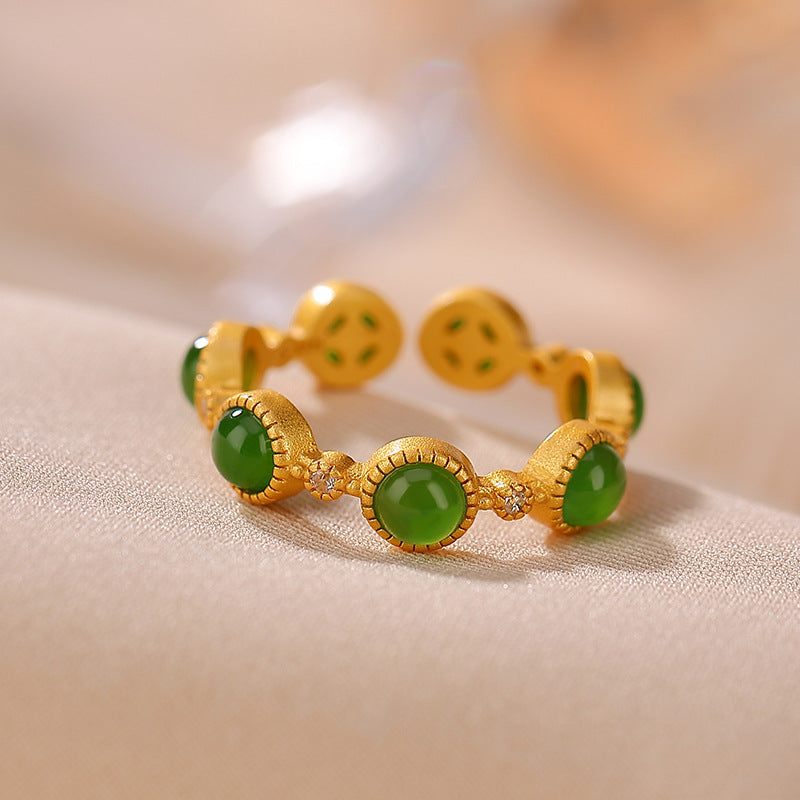 Green Seven Stone Ring