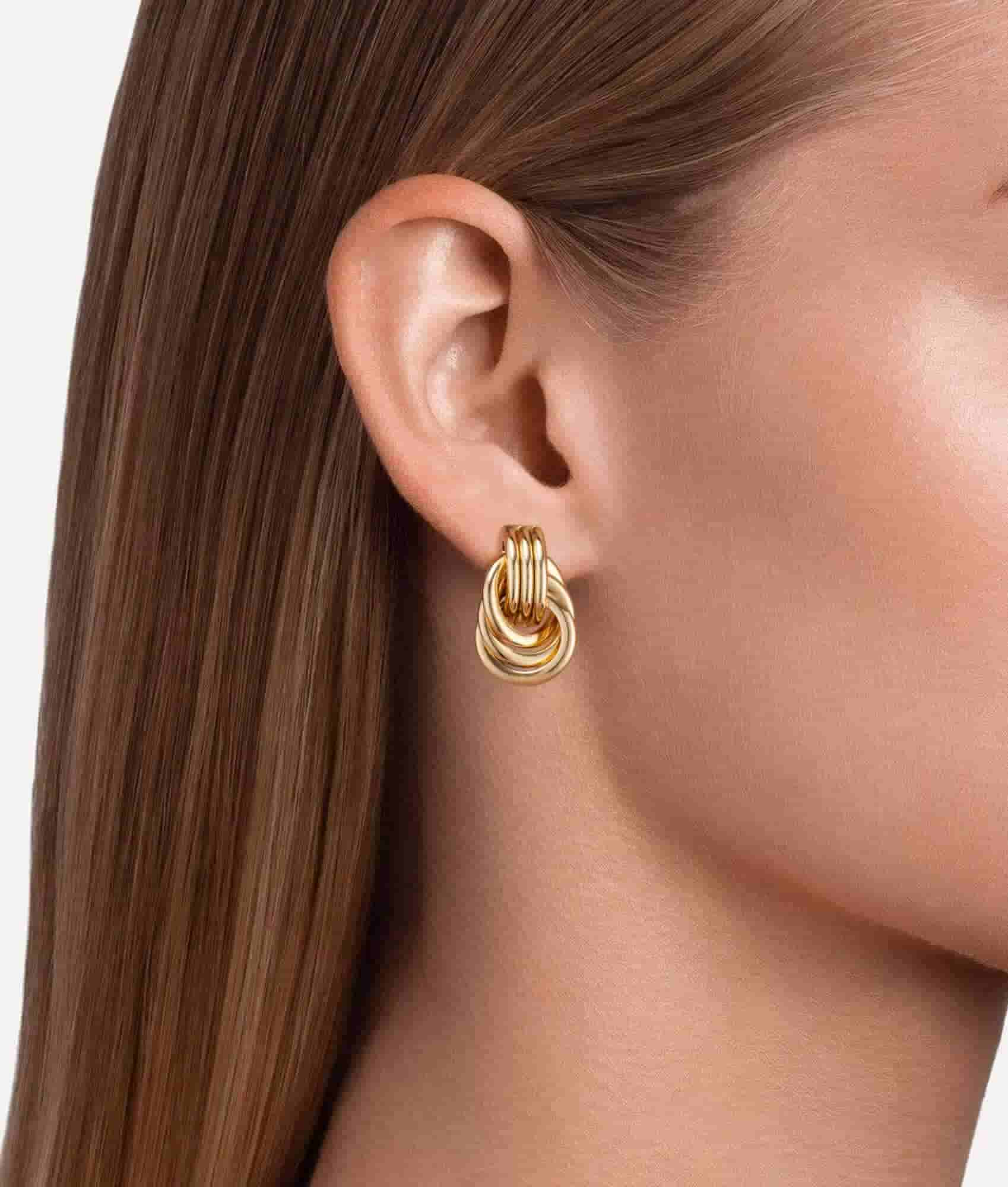 Gold-Knot-Earrings-On-Model