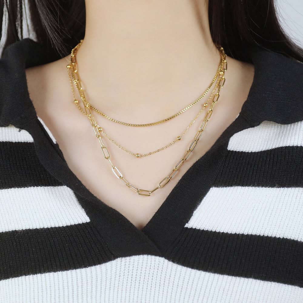 Model wearing Gold Layered Chains Necklace