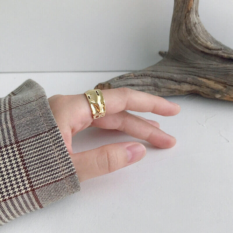 Model wearing Gold Foil texture ring