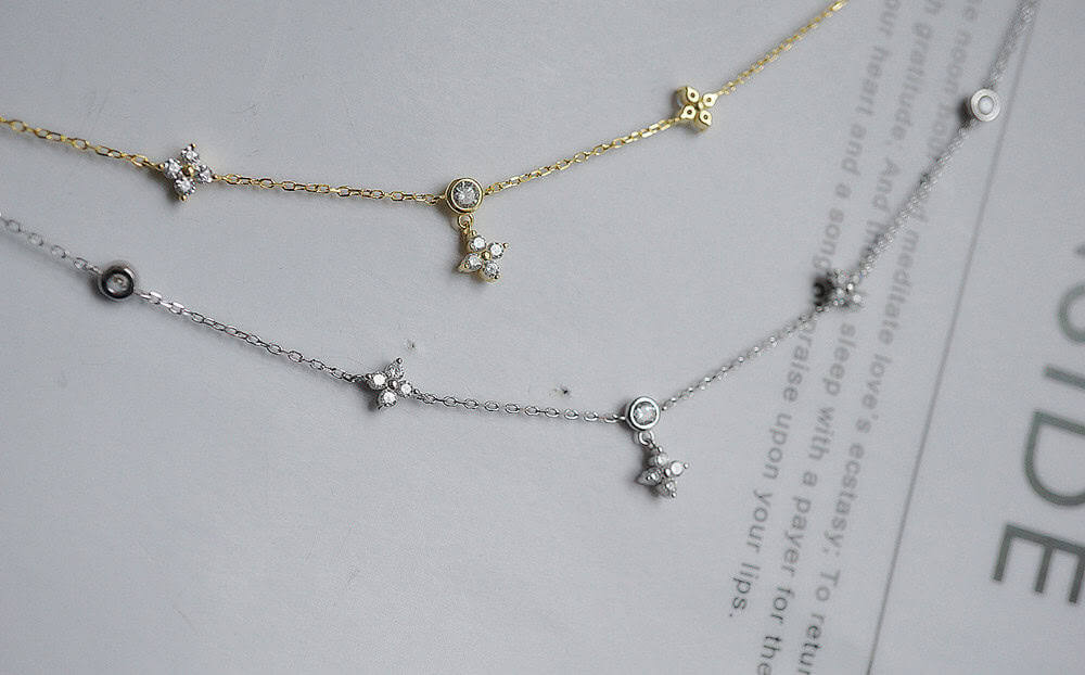 zircon clover necklace gold and silver
