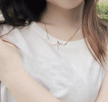 Silver Heartbeat Pendant Necklace