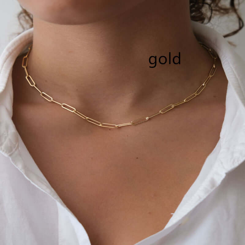 Model wearing gold Paperclip Choker Necklace