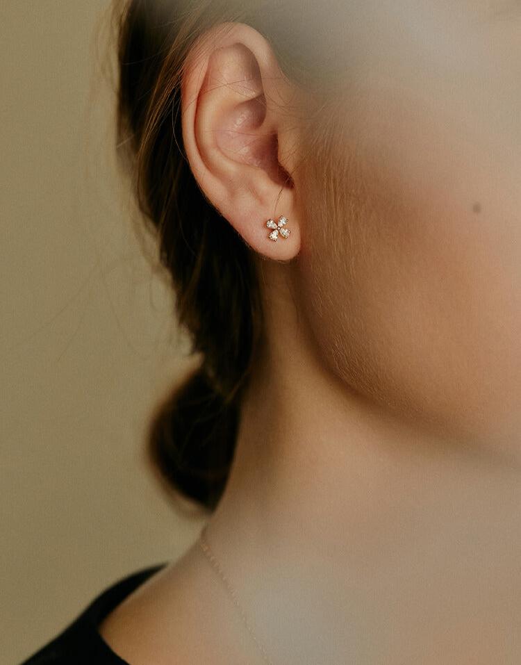 Model Wearing Clover Leaf Earrings