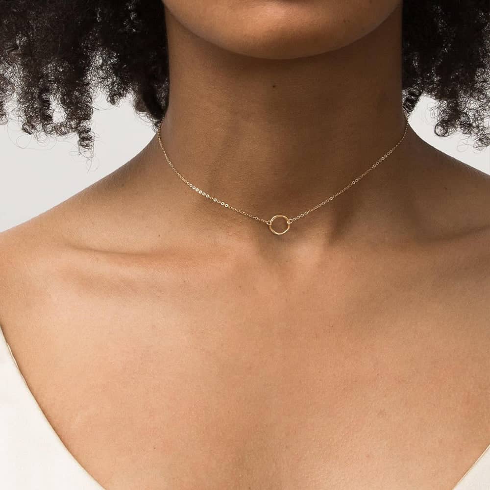 Model wearing Gold Ring Pendant Necklace