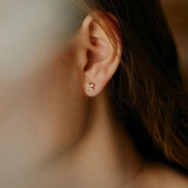 Model Wearing Clover Leaf Earrings