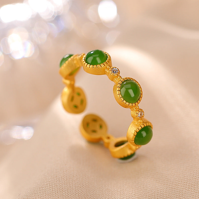 Green Seven Stone Ring