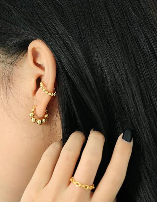 Model wearing Geometric Gold Bead Earrings