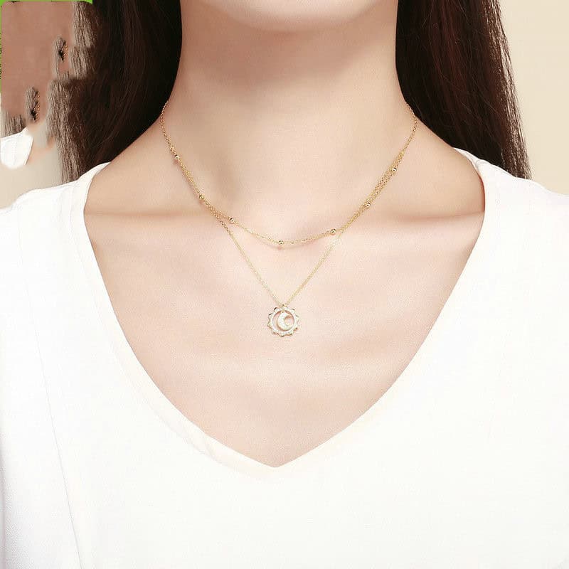 Model wearing Gold plated Sun & Moon Necklace