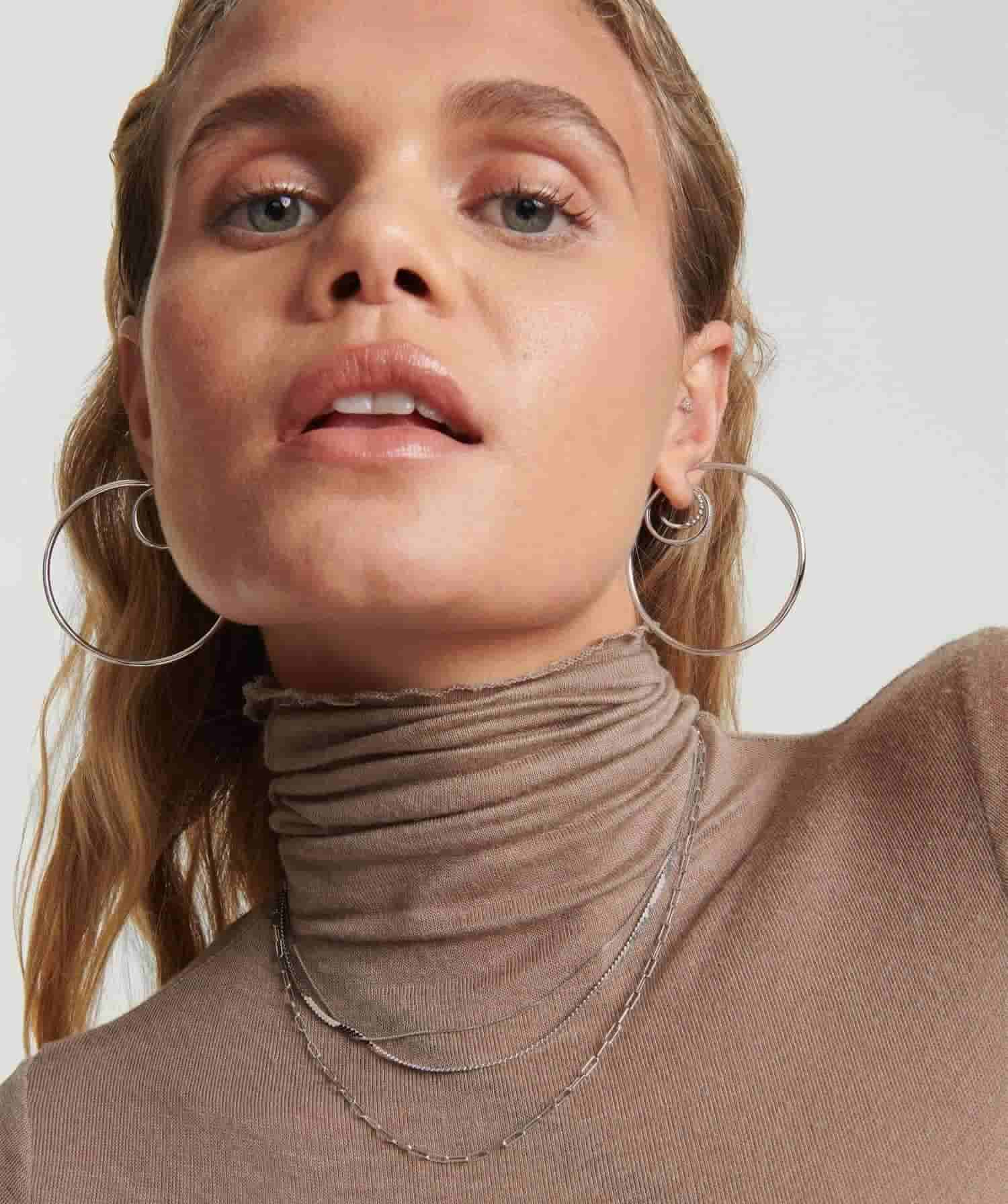 Model wearing Silver Oversized Hoop Earrings