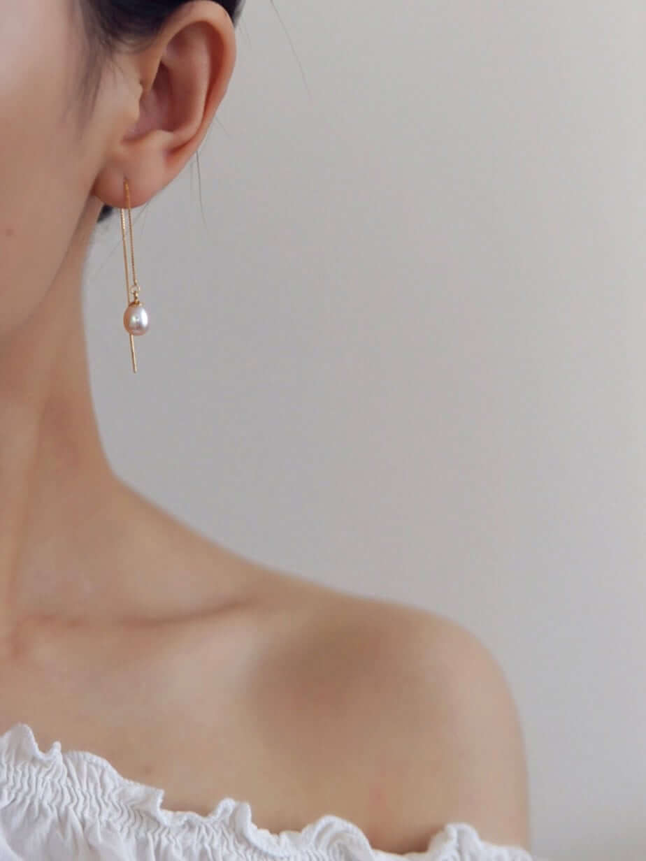 Model wearing Pearl Chain Threader Earrings