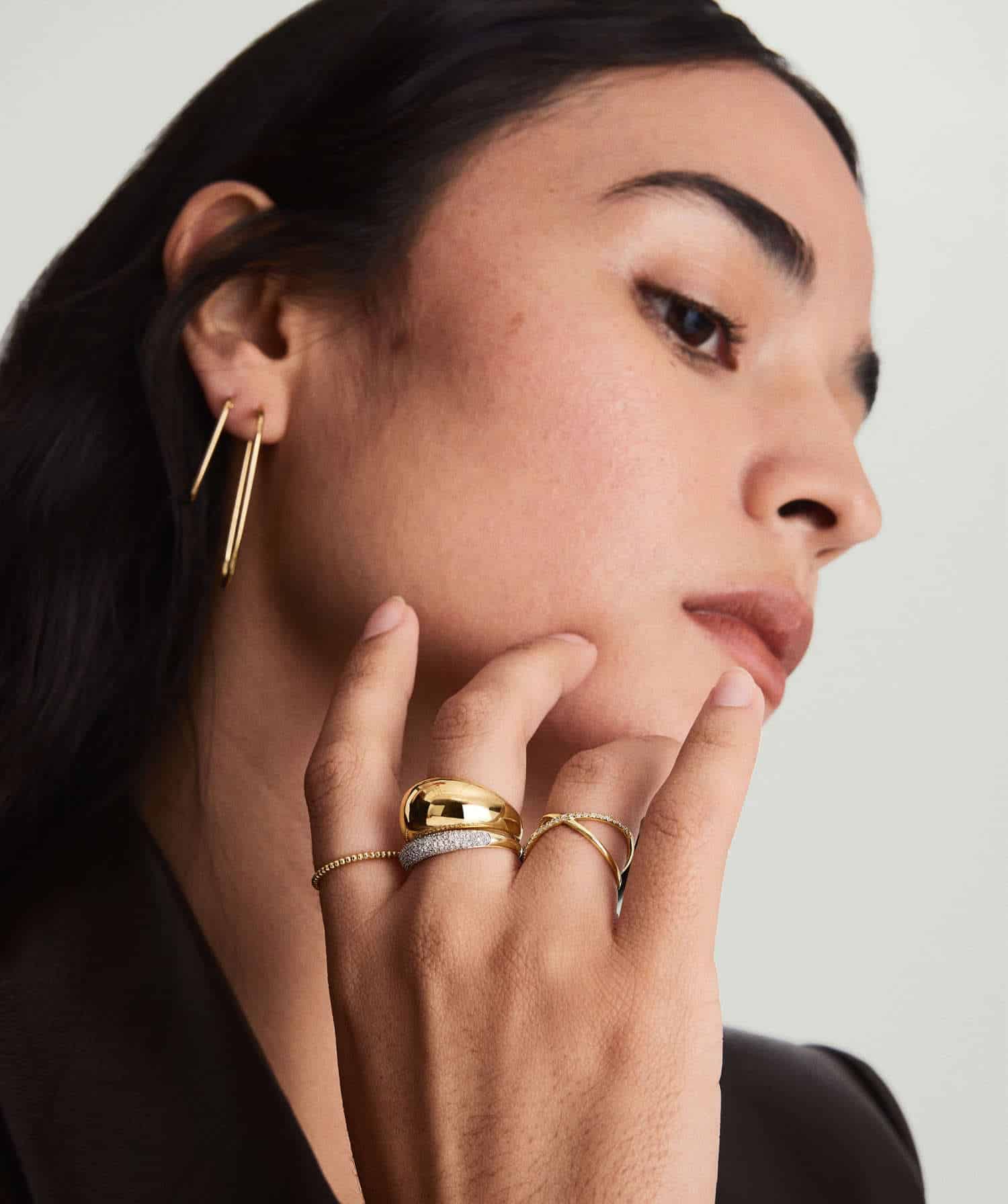 Model wearing Gold Dome Ring with diamonds
