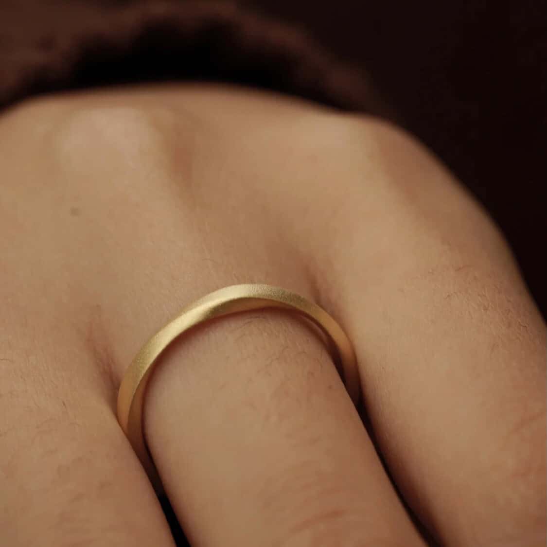 a woman wearing a Stackable Diamond Matte Ring