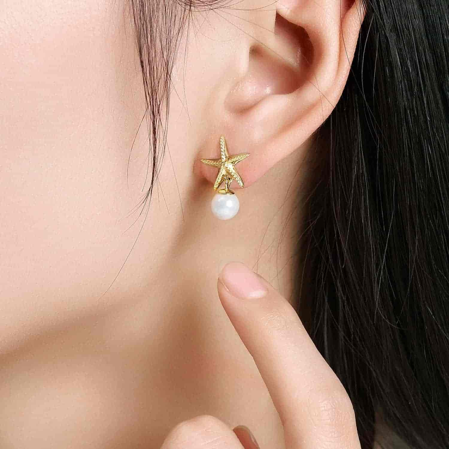 Model wearing Starfish Pearl Earrings