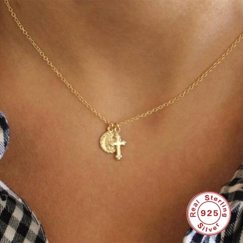 Model wearing coin gold Cross Charm Necklace