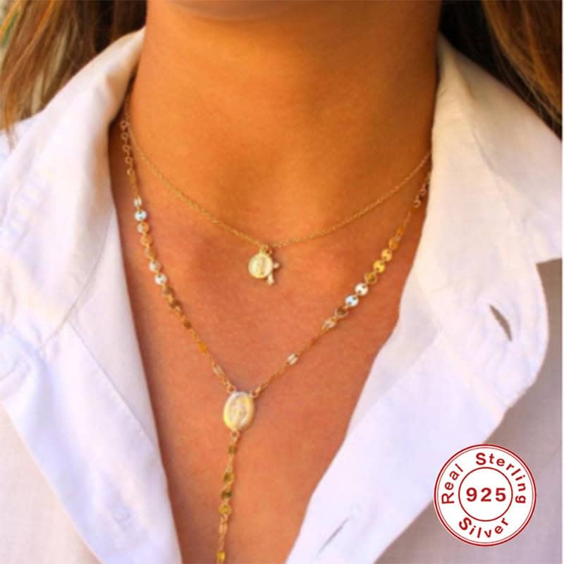 Model wearing coin gold Cross Charm Necklace