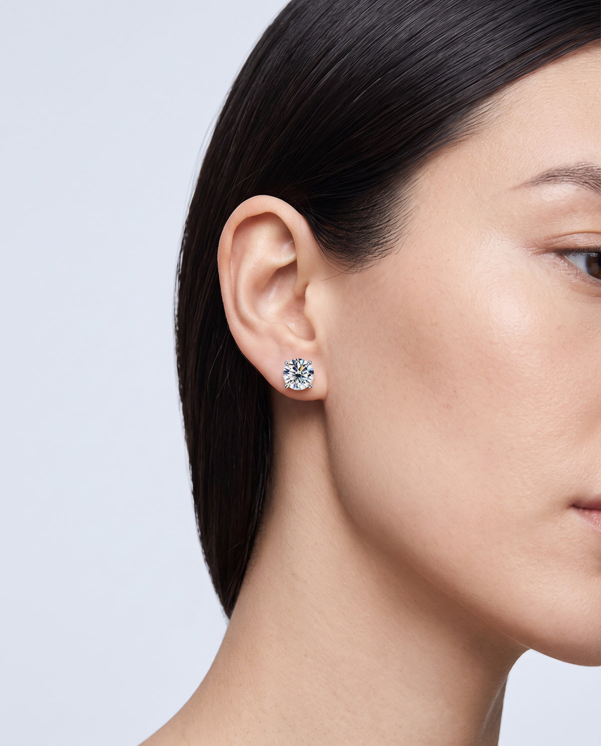 Spark Moissanite Claw Stud Earrings - on model