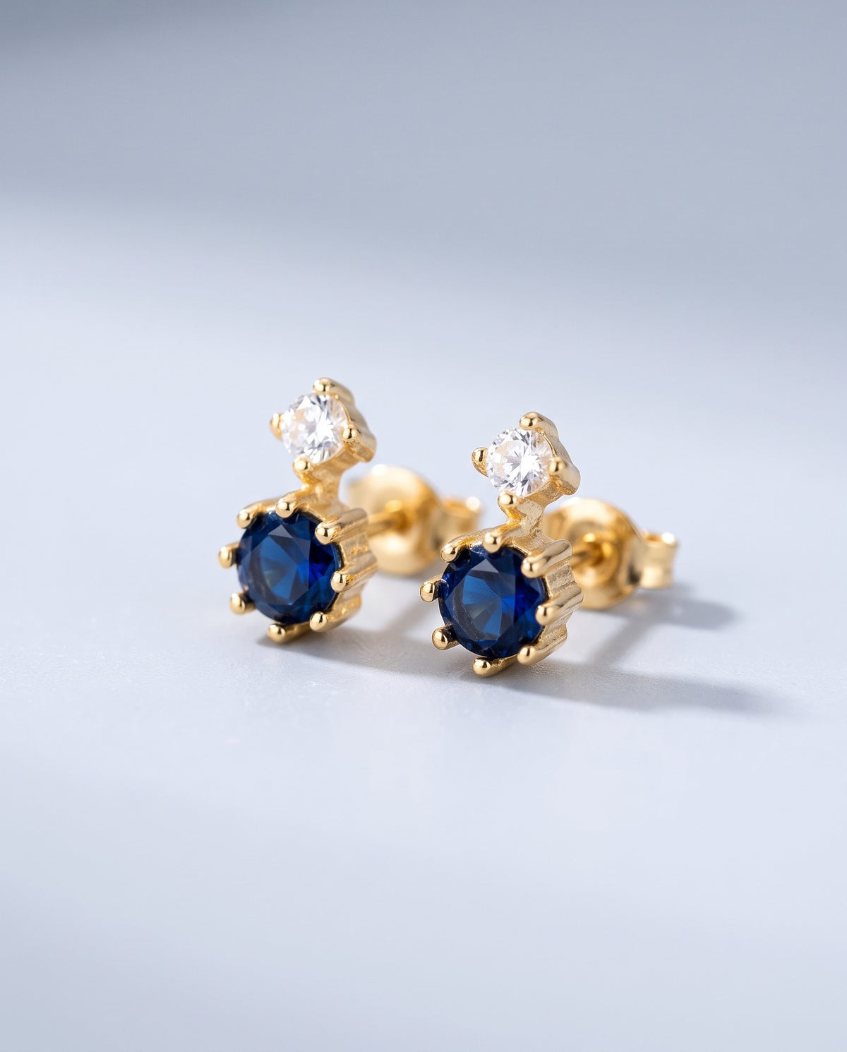 Tiara Blue Stone Stud Earrings - angle