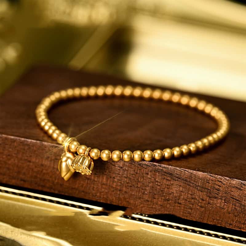 Lotus Charm Gold Beads Bracelet