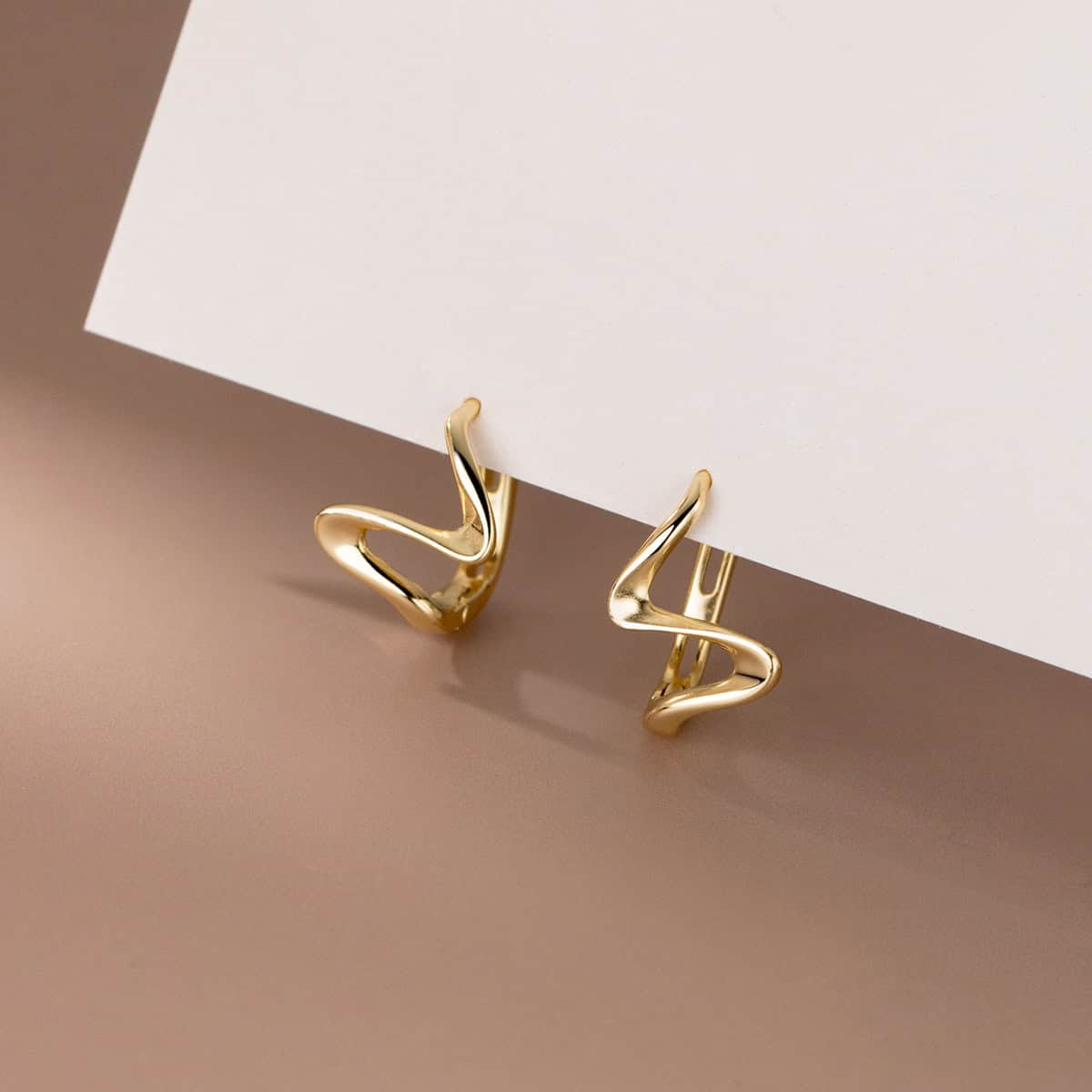 Gold Clip Wave Earrings